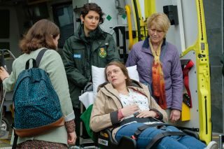 Jade with her family as Susie is transferred from an ambulance to the ED