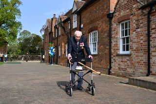 Captain Tom Moore with a walker