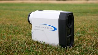 Nikon Coolshot 20 GII Laser Rangefinder lying on grass