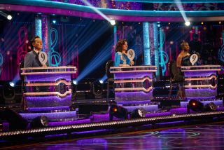 Shirley Ballas with fellow judges Craig Revel Horwood and Motsi Mabuse, all holding up '9' score paddles