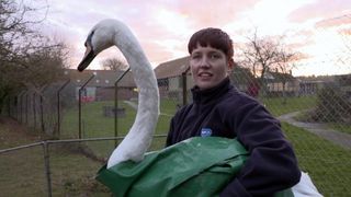 The RSPCA's Natalie holding a swan
