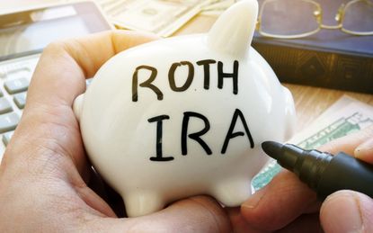 Piggy bank with Roth IRA written on it