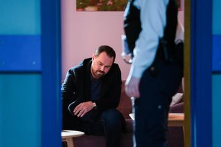 Mick goes to the police station in EastEnders