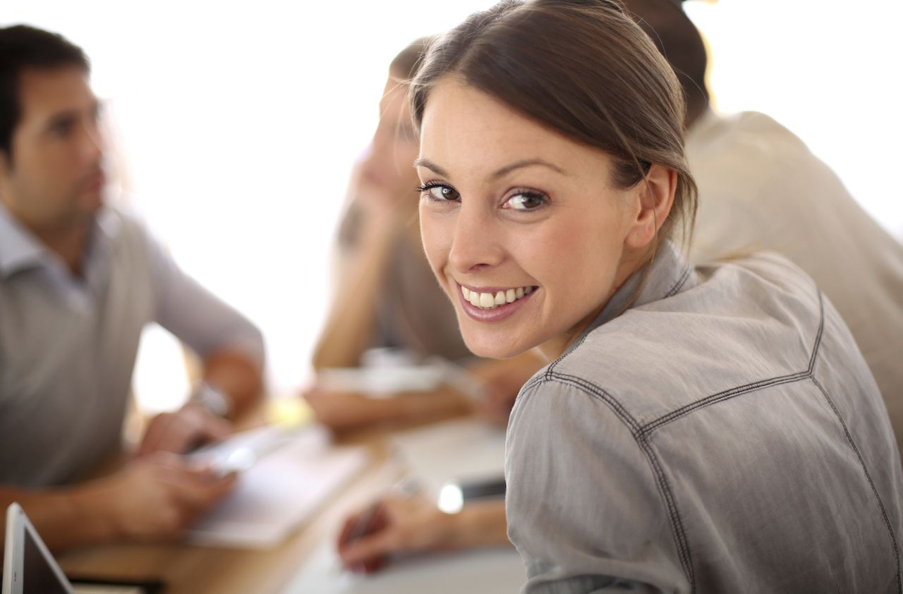 Smiling woman in office