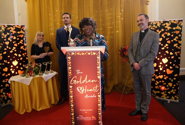 Aggie Bailey collects her award