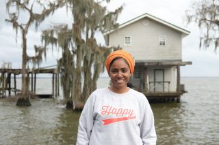 Nadiya Hussain outside a home on the Mississippi