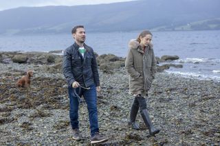 Martin Compston and Sophie Rundle on a beach