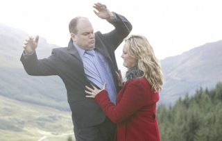 Janine Butcher pushes Barry Evans off a cliff.