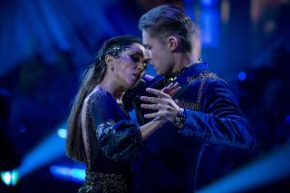 HRVY and Janette Manrara perform a tango in close hold
