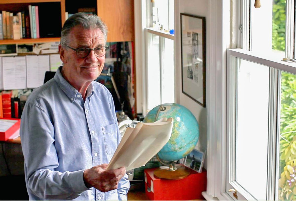 Michael Palin poses with a globe for his new BBC2 series Michael Palin&#039;s Travels