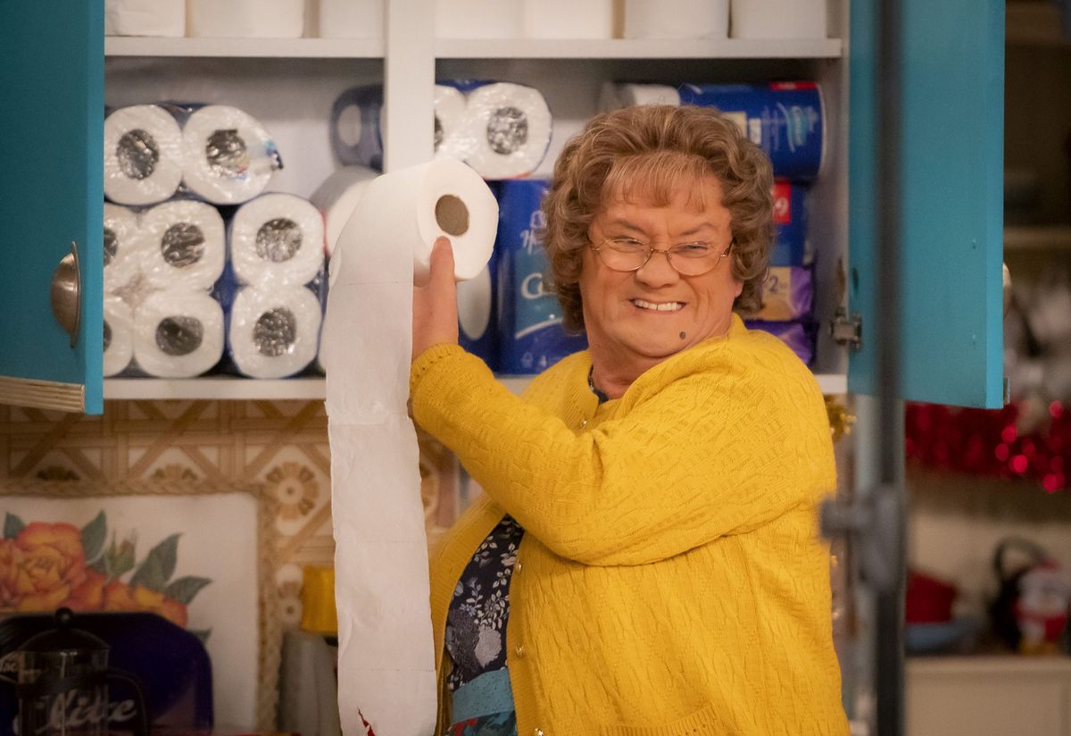 Mrs Brown gleefully stashing toilet roll