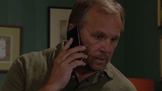 Will Taylor makes a furtive phone call in Emmerdale