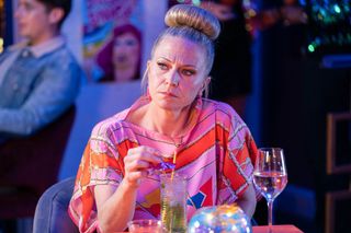 Linda Carter has a mocktail in EastEnders