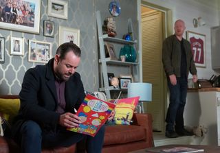 Mick Carter is home with a bruised eye in EastEnders