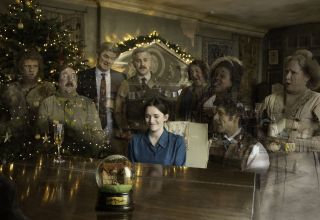 Alison and ghosts in the Ghosts Christmas special