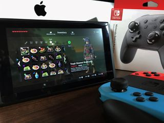 The Legend of Zelda: Breath of the Wild on Nintendo Switch with Pro Controller box