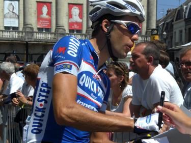 The Quick Step riders sign in