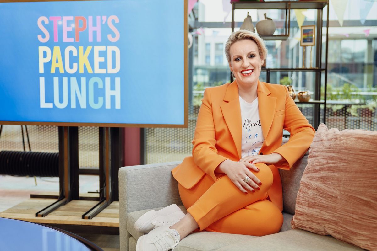 Steph McGovern in a jazzy orange suit on the set of Steph&#039;s Packed Lunch