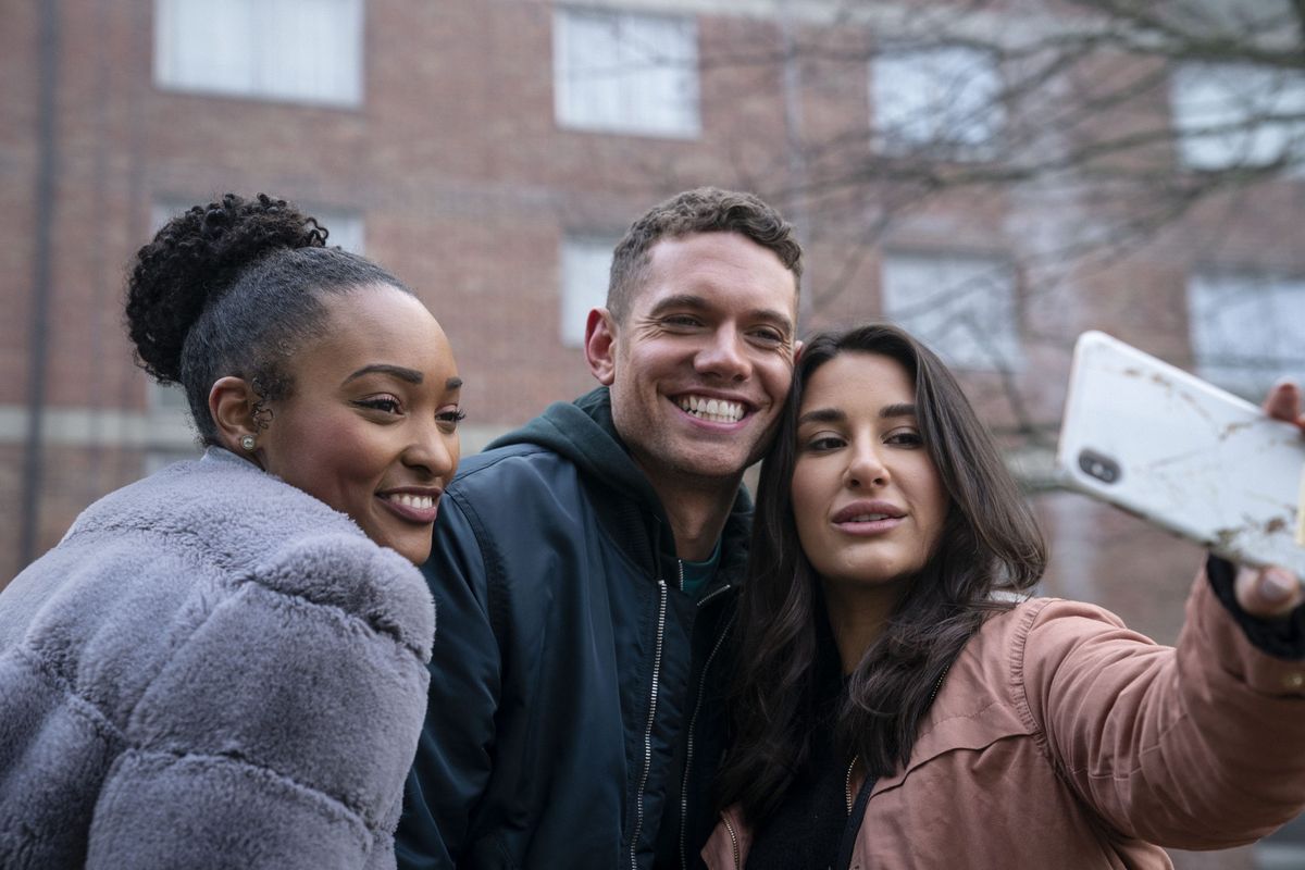 Tom Brittney as Billy Fearon, posing for a selfie with fans in the drama