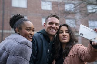 Tom Brittney as Billy Fearon, posing for a selfie with fans in the drama