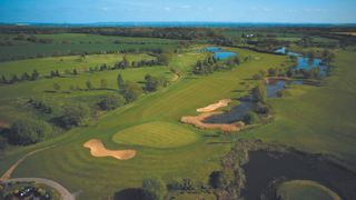 An aerial view of the par-5 18th at Magnolia Park