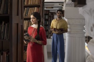 Lata in the library with smitten Kabir.
