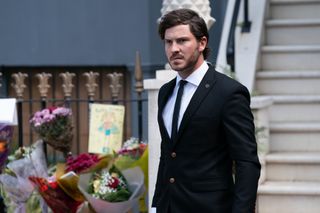 Gray is struggling at Chantelle's funeral in EastEnders