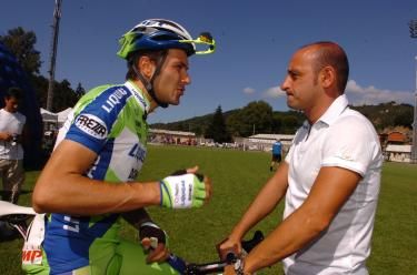 Ivan Basso making a point to Paolo Bettini