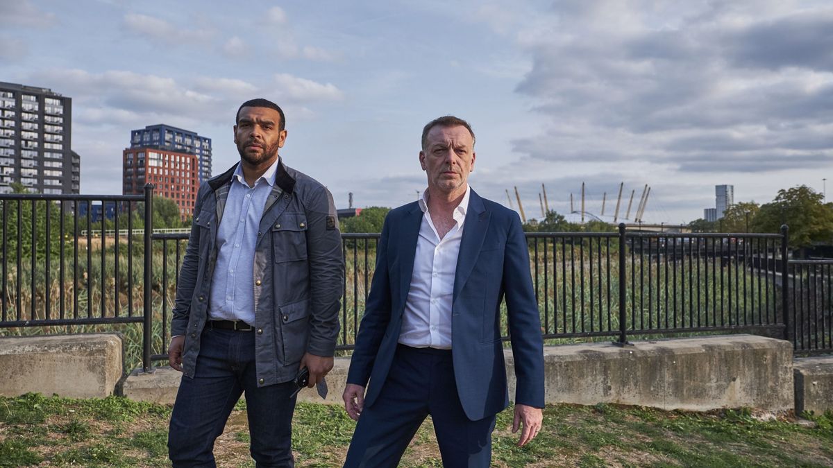 Hugo with Bailey in front of London backdrop